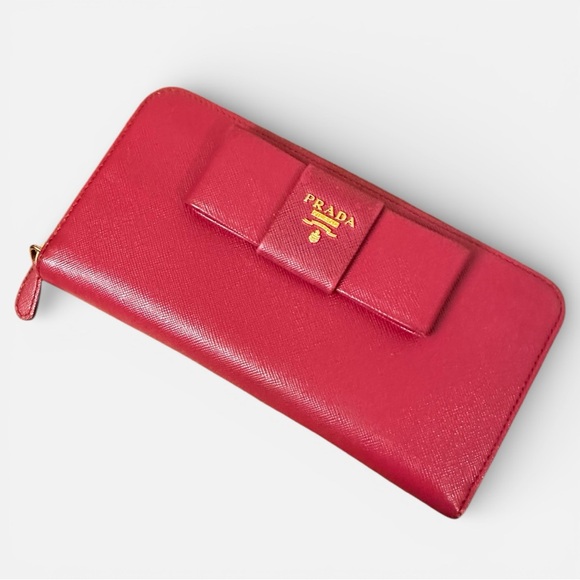 Authentic Prada Elegant Bow Wallet in dark pink/purple color. - Picture 2 of 16